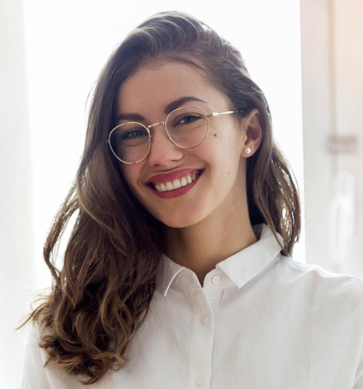 beautiful-smiling-businesswoman-with-eyeglasses-2F9GDZX.jpg